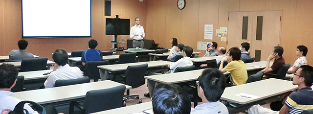 Dr. Ludovico Minati delivers the first WRHI invited speaker lecture
